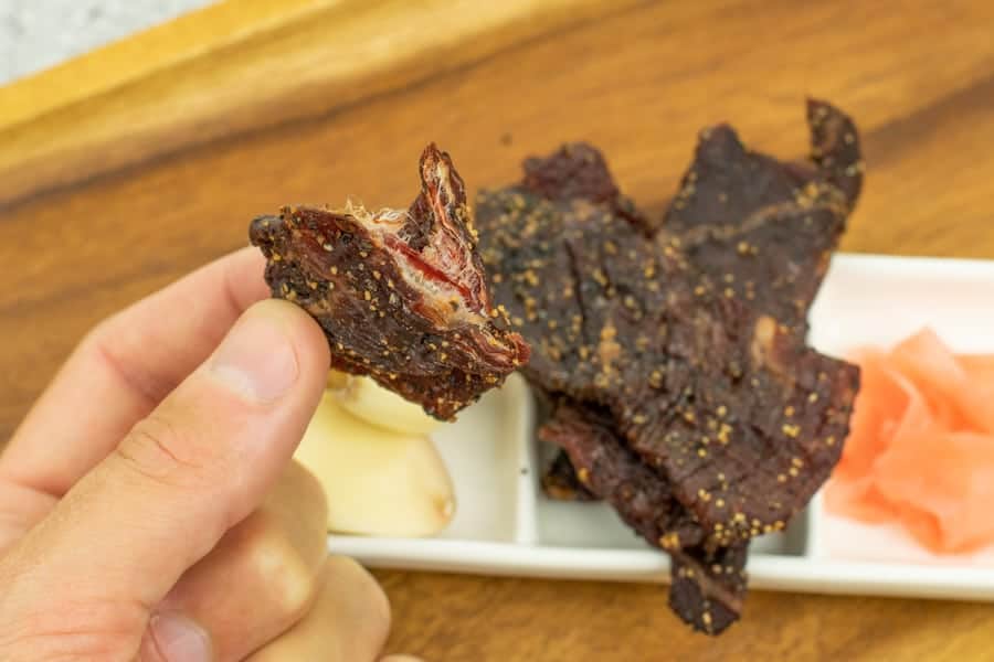 Beef jerky finished cracked in half