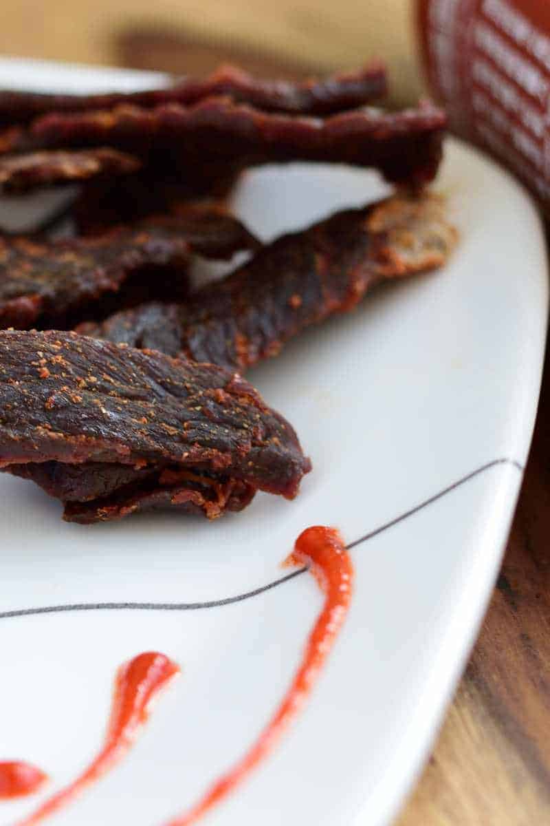 A sriracha beef jerky that doesn't over power you with spice, but rather blends in with the other flavors making a perfect jerky | Jerkyholic.com