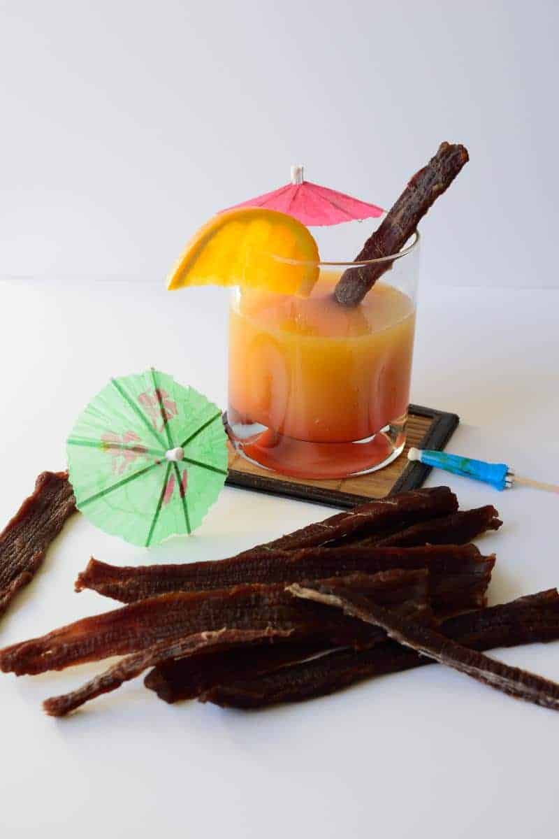 This Mai Tai Beef Jerky has all the great flavors of this tropical drink. It will take you back to a memory of you sitting by the pool or on the beach soaking up some sun and having a refreshing drink. | Jerkyholic.com