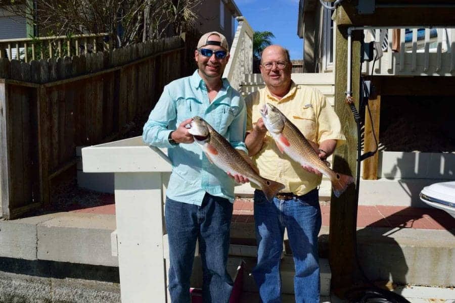 My Dad & I Holding Redfish