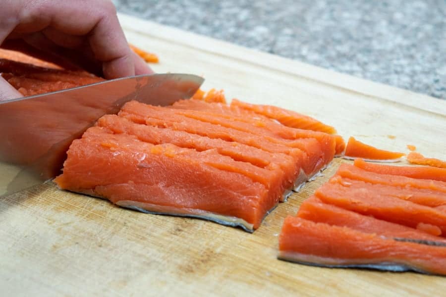 Wild sockeye salmon filet cut in small strips for jerky