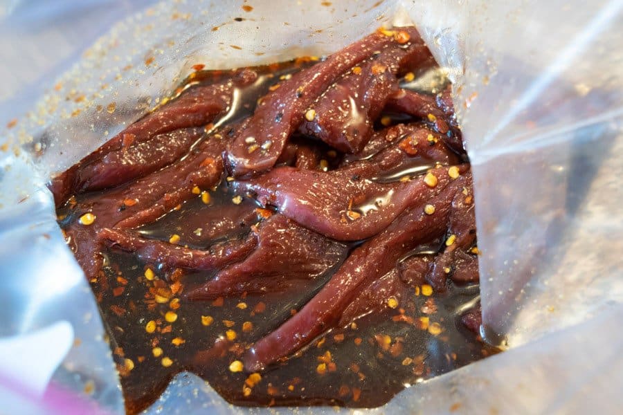 Beef Jerky strips marinating ziplock bag