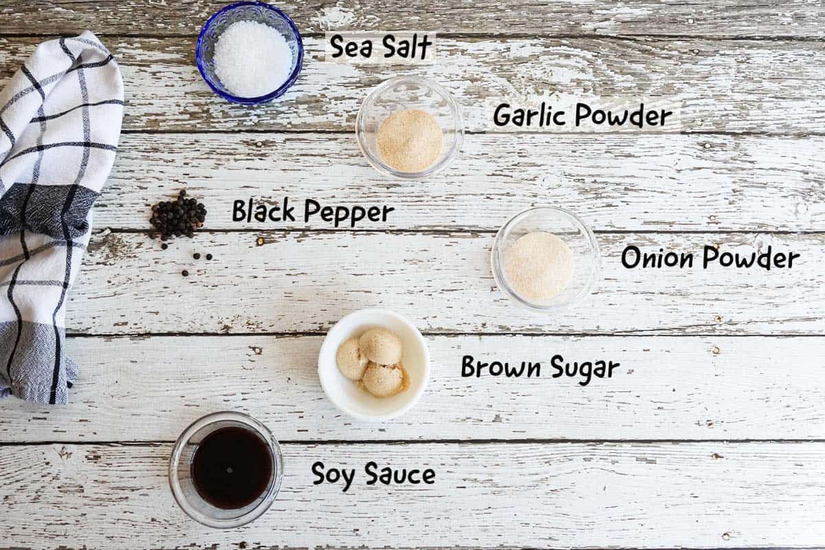 Recipe ingredients with labels on white wood background