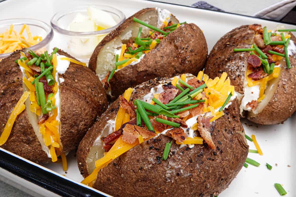 loaded baked potatoes in dish
