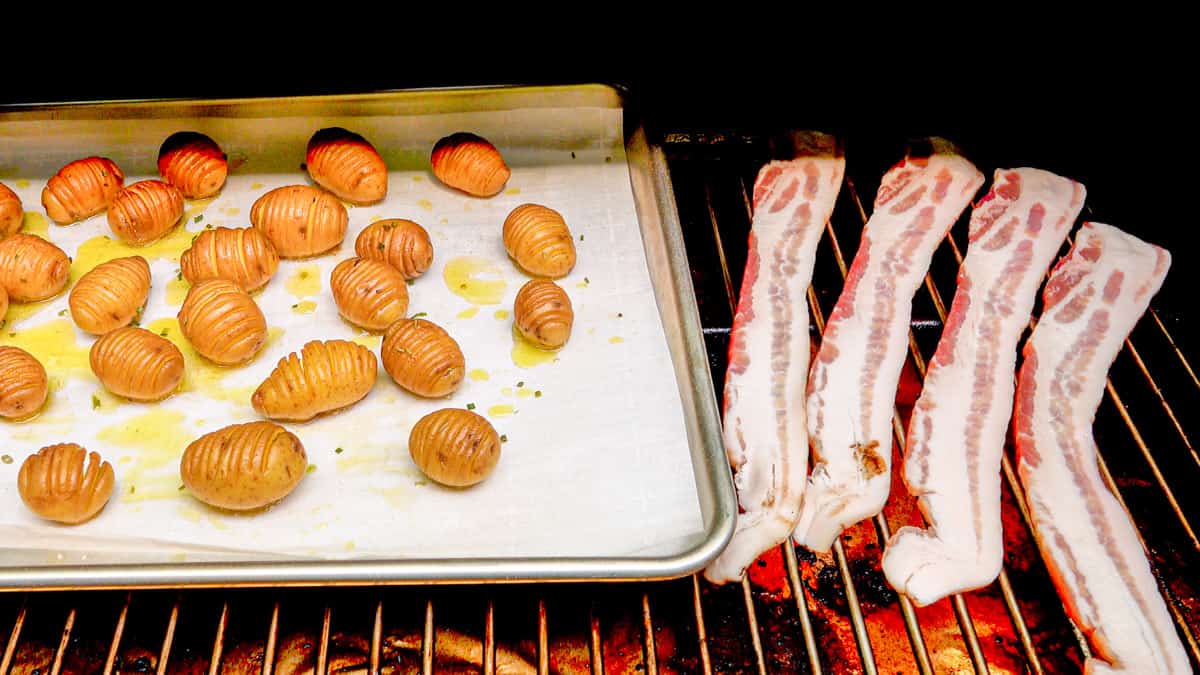 Bacon and potatoes in smoker