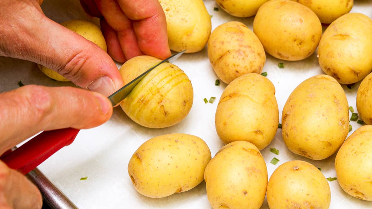 Slicing potato by hand