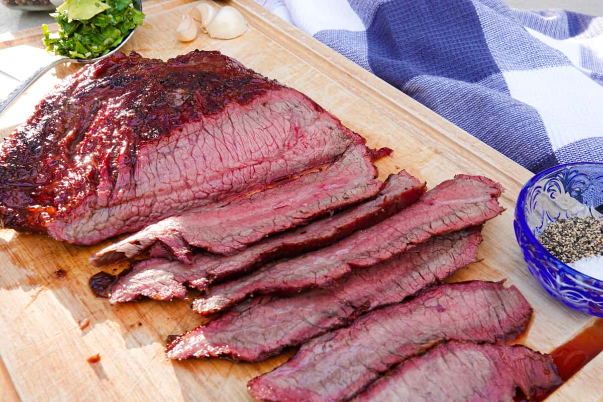 flank steak sliced on cutting board